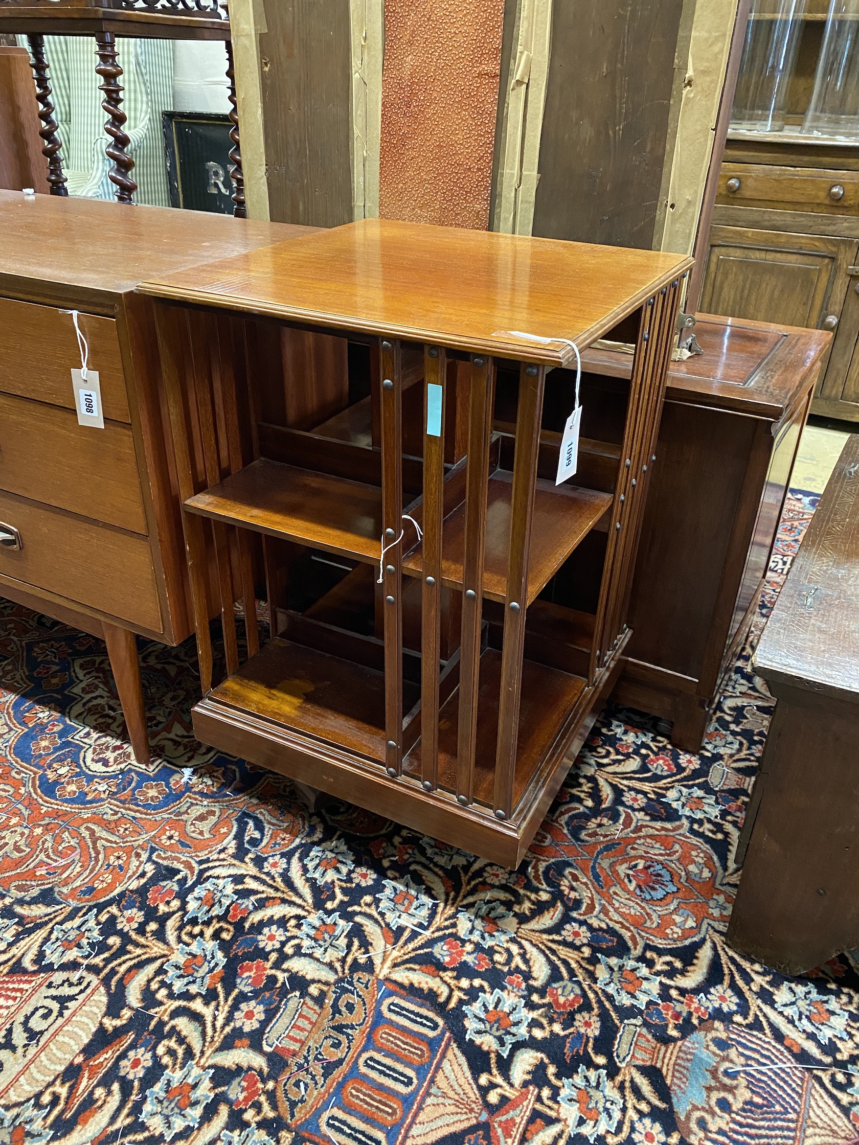 An Edwardian mahogany revolving bookcase, width 49cm, depth 49cm, height 79cm